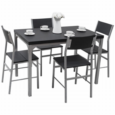 A mesa de jantar preta de madeira da casa ajustou 4 cadeiras de Seater com quadro do metal